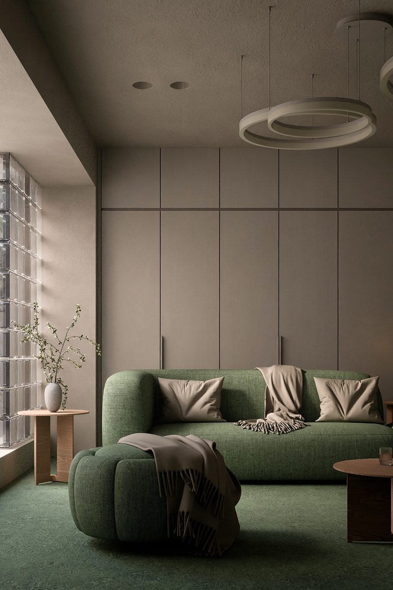 Green Room, view 1: Green upholstery, ring lamps and a glass-block window.