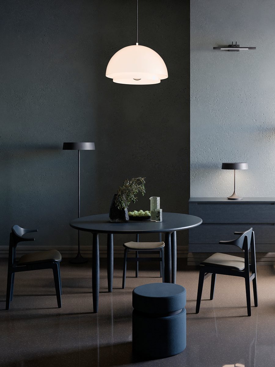 Night Table, view 1: A dark dining room lit by one white pendant.
